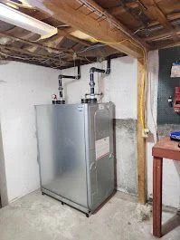 New high-efficiency boiler installed in a basement