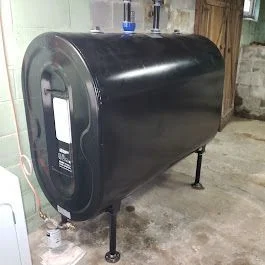 New oil tank installed in a basement
