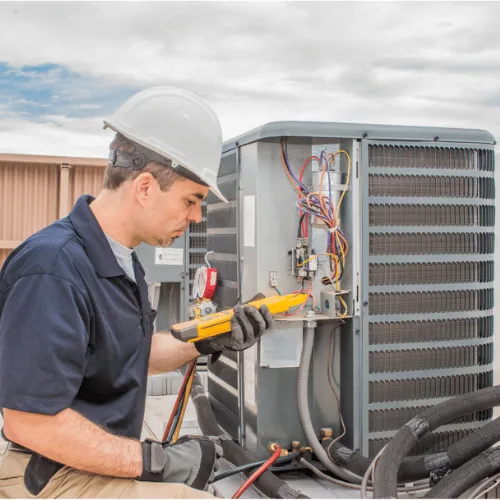 DaSilva technician testing an outdoor air conditioning unit